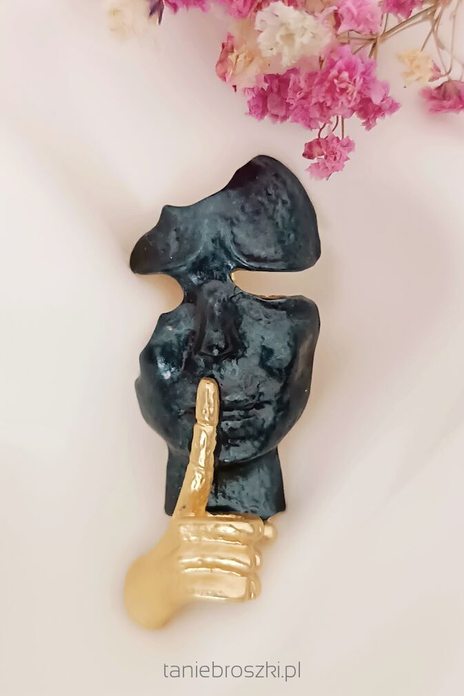 Nowoczesna broszka czarna twarz