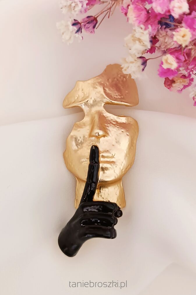 Nowoczesna broszka twarz