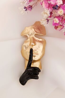 Nowoczesna broszka twarz