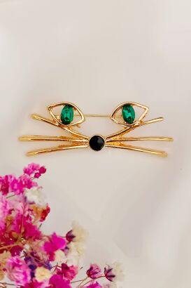 Śliczna broszka oczy kota