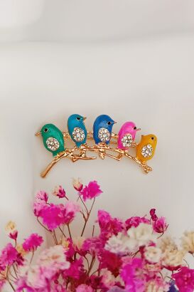 Pastelowe ptaszki na gałęzi