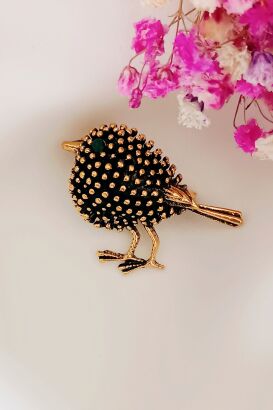 Metalowy maleńki ptaszek